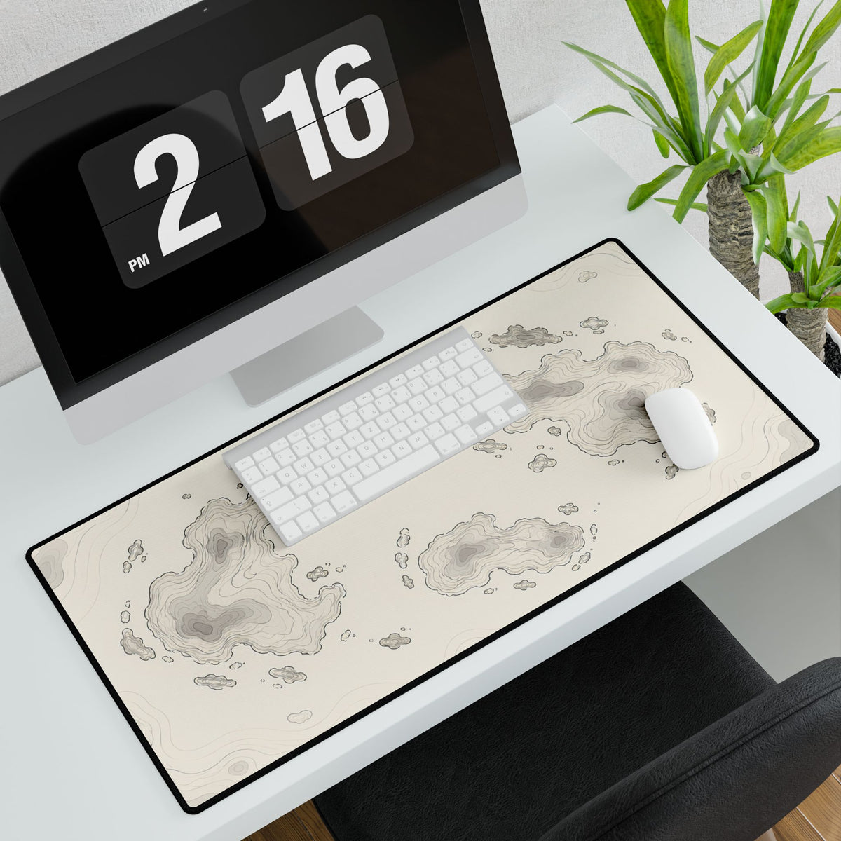 Neutral Topographic Desk Mat, 31.5 × 15.5 in, angled computer desk mockup with plant.