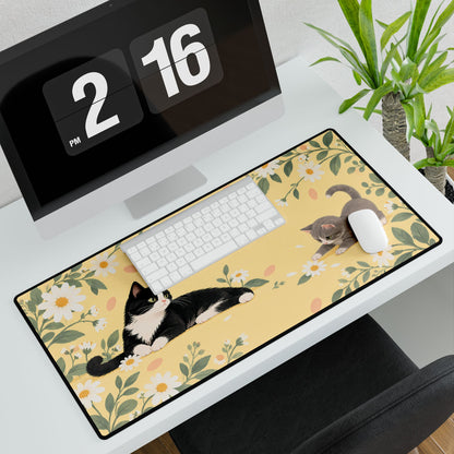 Daisy Cats Desk Mat, 31.5 × 15.5 in, angled computer desk mockup with plant.