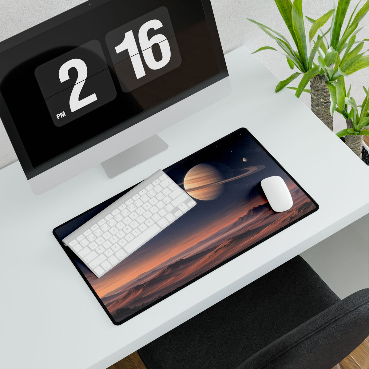 Saturn Dawn Space Desk Mat - Medium angled computer and plant setup | BTendance