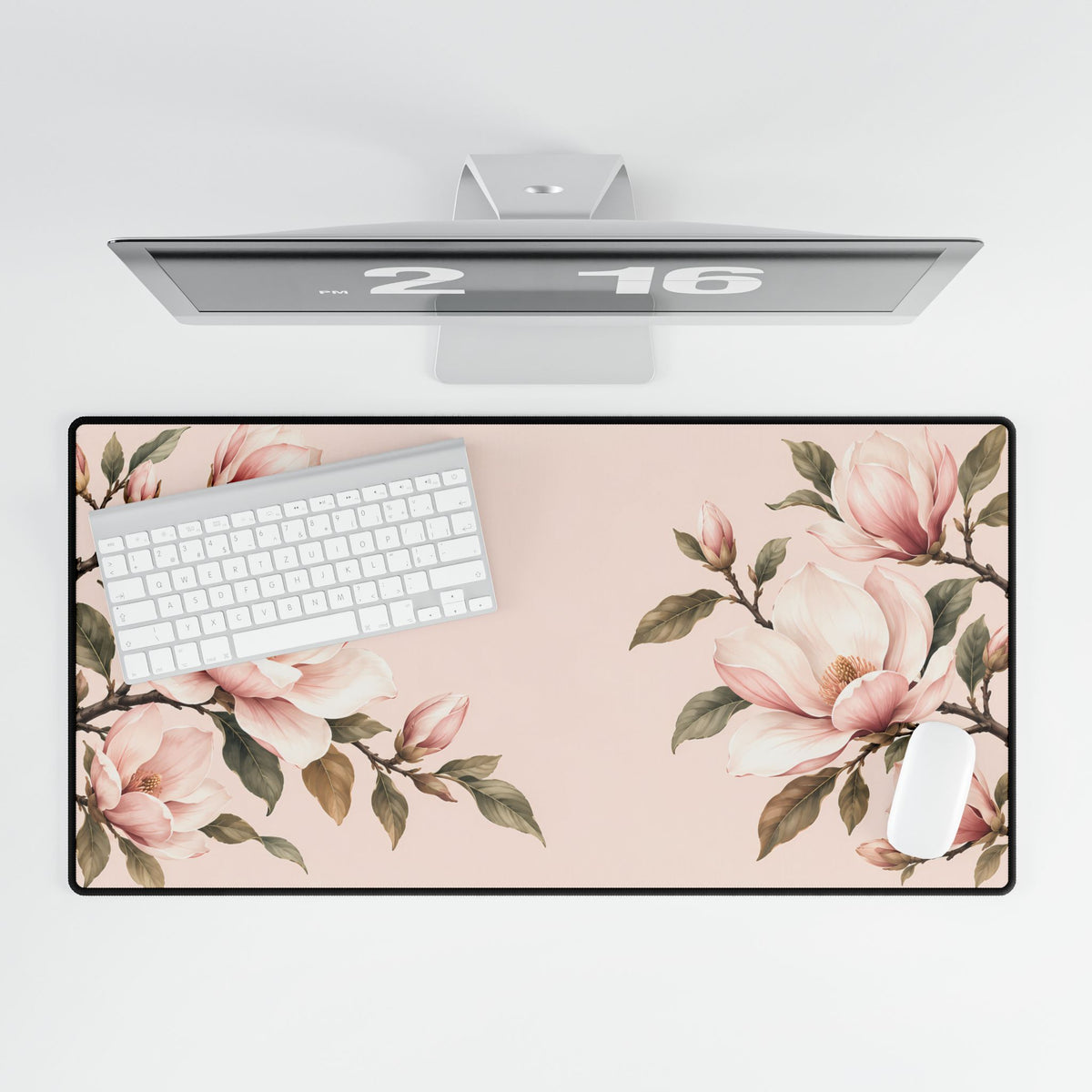 Blush Pink Magnolia Desk Mat, 31.5 × 15.5 in, overhead computer desk mockup.