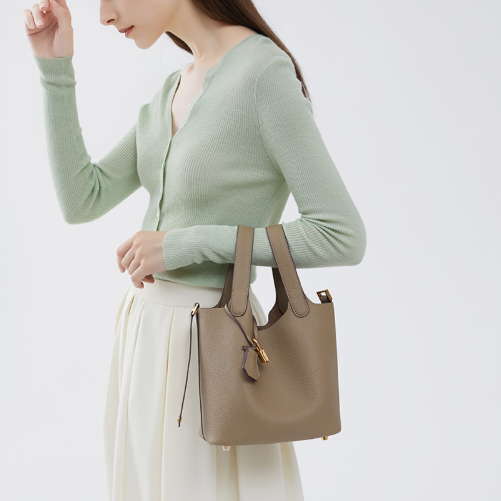 Soft Bucket Handbag – Twin Handles and Gold-Tone Detail — White, shoulder carrying from side | BTendance