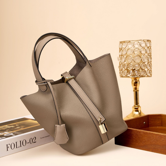 Soft Bucket Handbag – Twin Handles and Gold-Tone Detail — Brown, angled tabletop view | BTendance