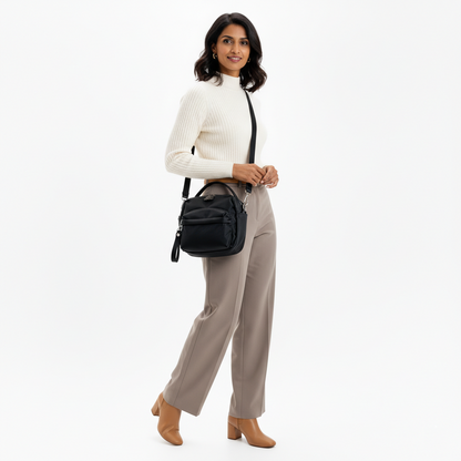 Multi-Pocket Crossbody Bag – Monceau Adjustable Strap — Black, front outfit styling | BTendance