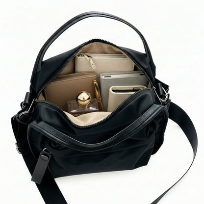 Multi-Pocket Crossbody Bag – Monceau Adjustable Strap — Black, open main compartment | BTendance