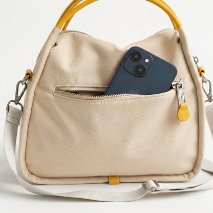 Multi-Pocket Crossbody Bag – Monceau Adjustable Strap — Beige, back pocket detail | BTendance