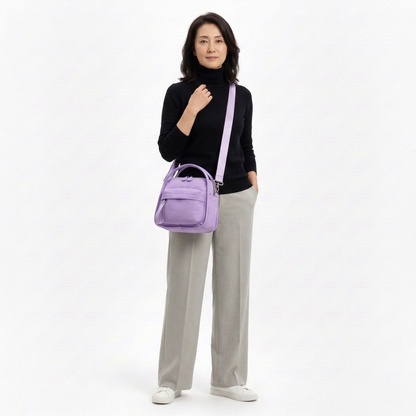 Multi-Pocket Crossbody Bag – Monceau Adjustable Strap — Lavender, crossbody outfit styling | BTendance