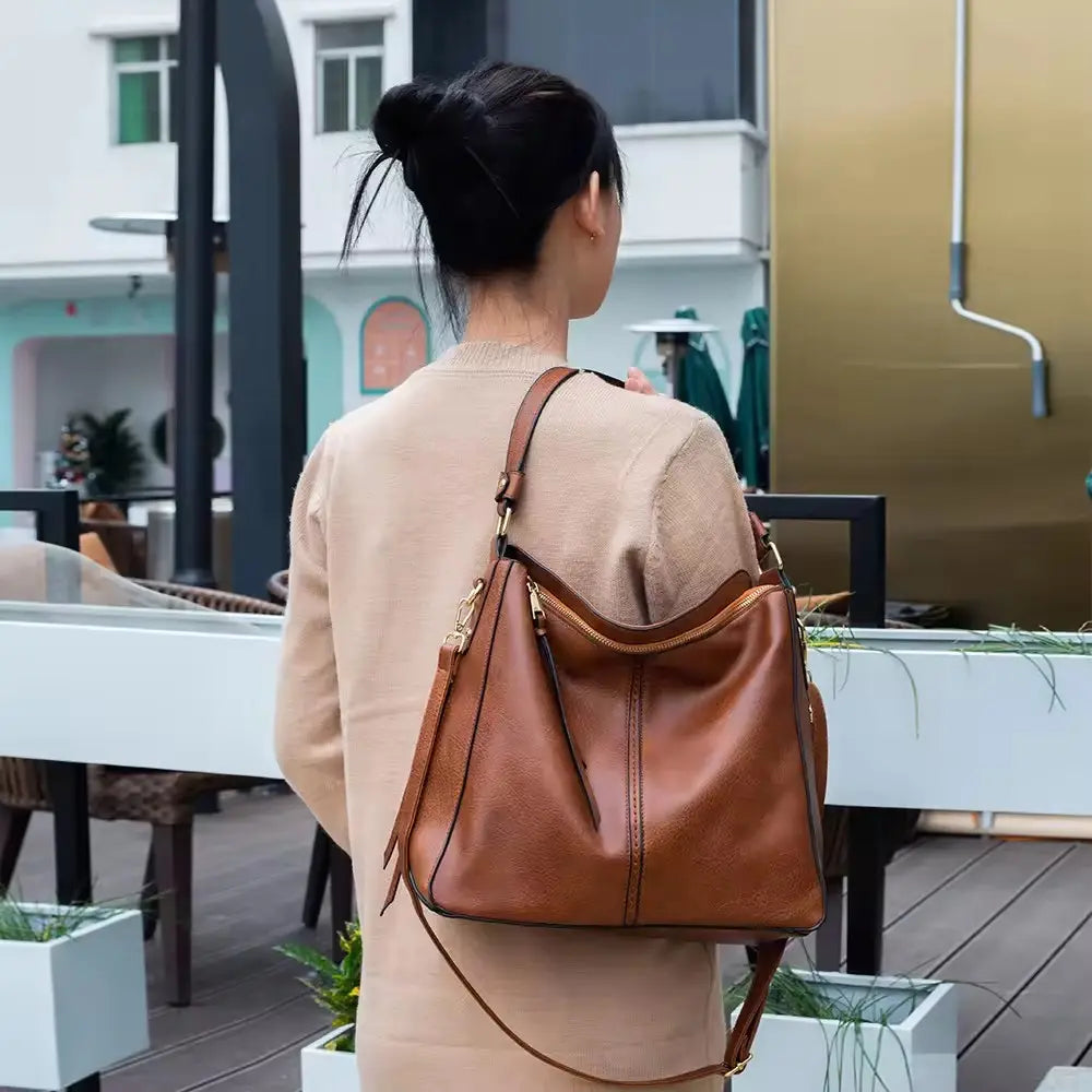 Hobo Shoulder Bag with Pouch – Adjustable Strap — Brown, shoulder styling from behind | BTendance