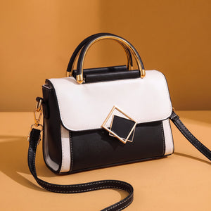 Colourblock Top Handle Handbag – Yelena Geometric Clasp — Black, front view | BTendance