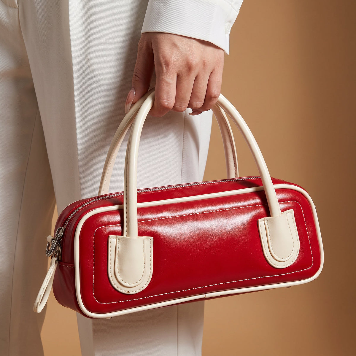 Retro Bowling Crossbody Bag – Camila Contrast Piping — Red, hand carrying for scale | BTendance