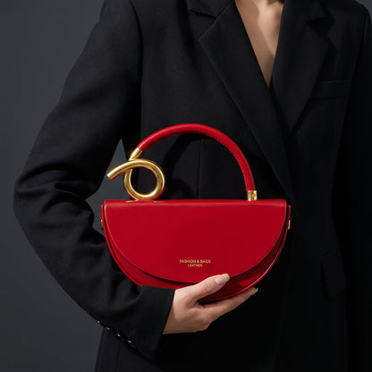 Vegan Leather Half-Moon Bag – Valeria Crossbody Strap — Red, hand-held front styling | BTendance
