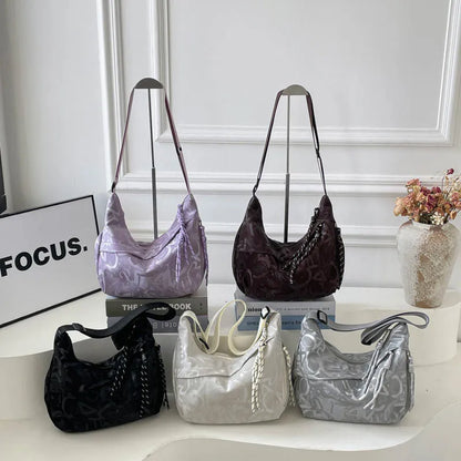 Patterned shoulder bag with braided front detail — five colors grouped on display | BTendance