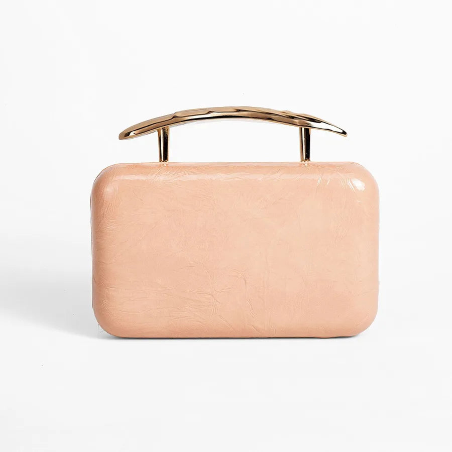 Textured rectangular evening bag with curved metal handle — peach front view | BTendance