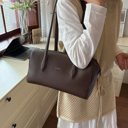 Rectangular shoulder bag with long twin handles — dark brown worn on shoulder | BTendance