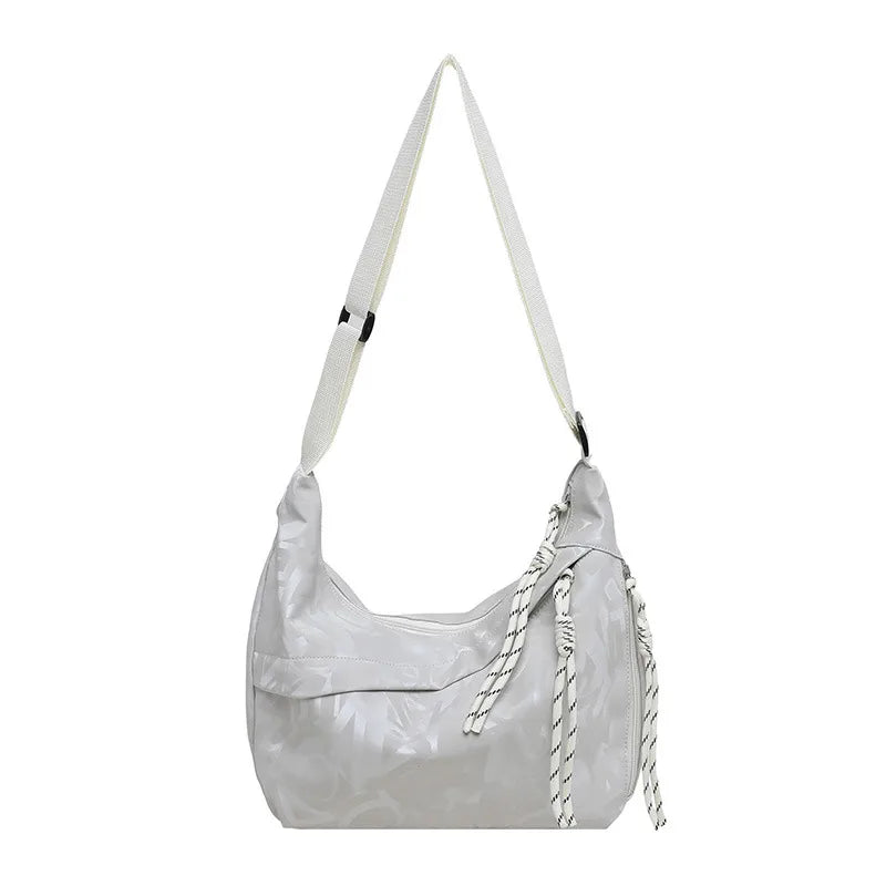 Patterned shoulder bag with braided front detail — white on white background | BTendance