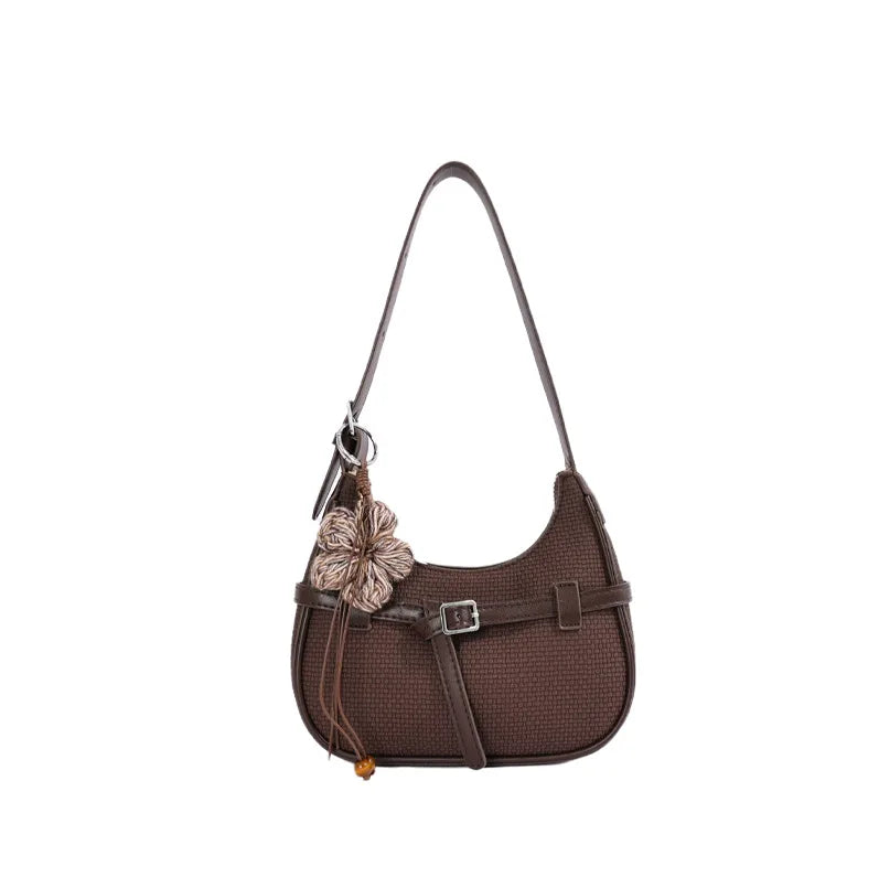 Buckle shoulder bag with floral charm – Dark brown bag on white background | BTendance
