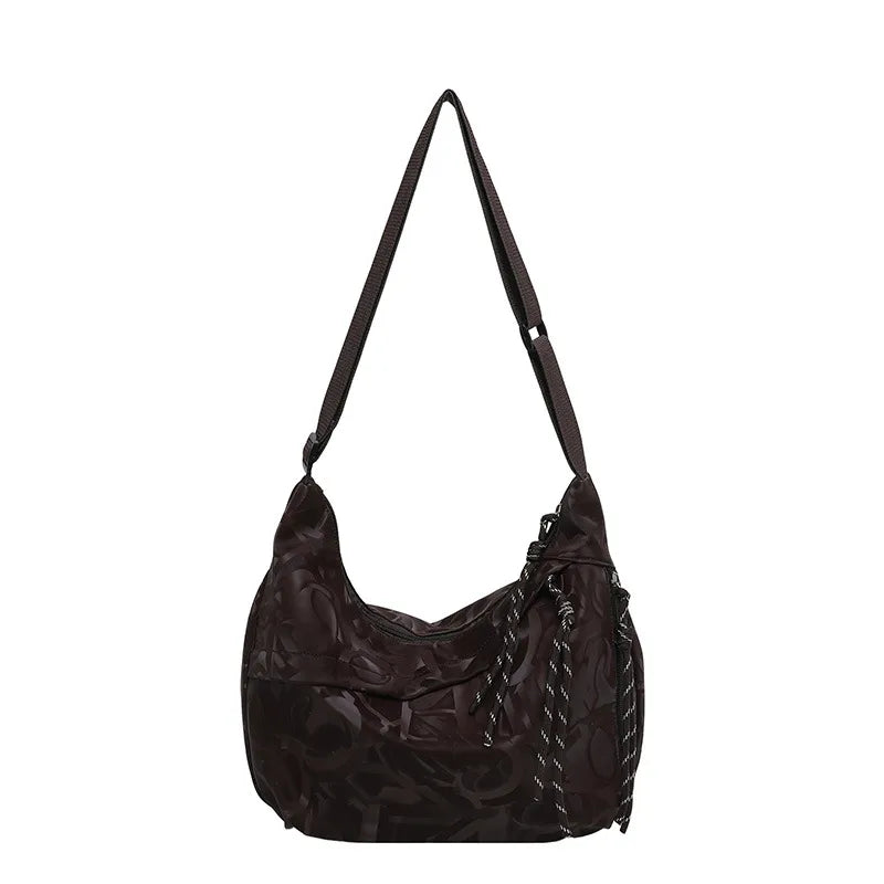 Patterned shoulder bag with braided front detail — brown on white background | BTendance