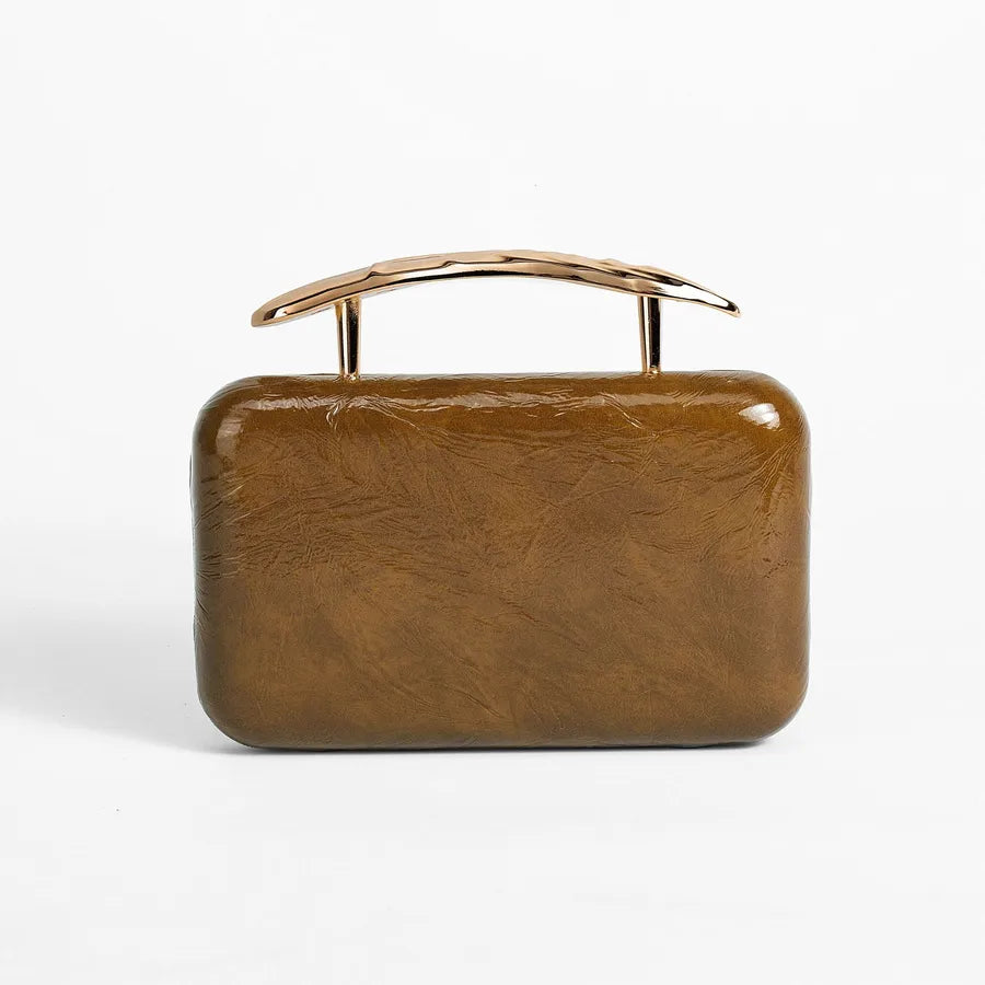 Textured rectangular evening bag with curved metal handle — ochre front view | BTendance