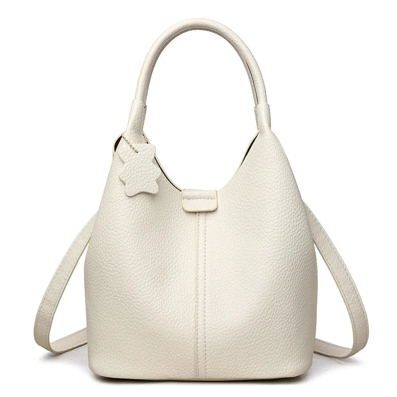 Bucket handbag with shoulder strap and bear charm – Ivory bag, front view | BTendance