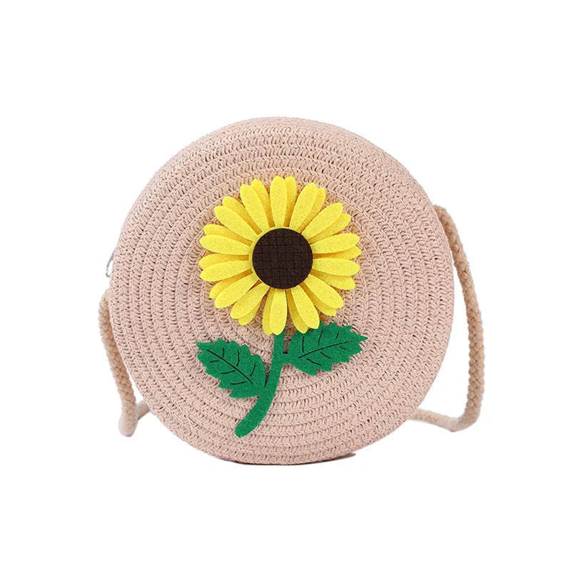 Round woven sunflower crossbody bag – Pink stem and leaf sunflower bag on white background | BTendance