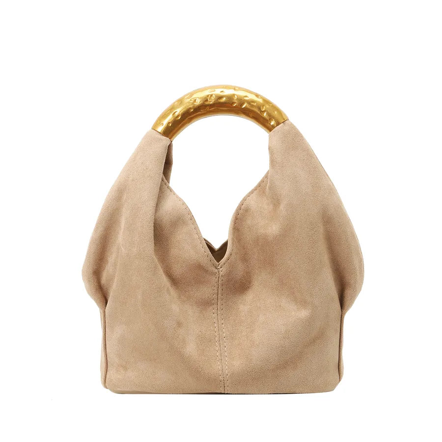 Suede-look bucket handbag with curved gold-tone handle — beige front view on white background | BTendance