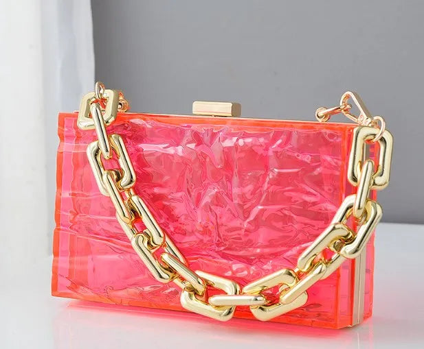 Transparent box bag with gold tone chain – Bright pink bag with chunky chain, front view | BTendance