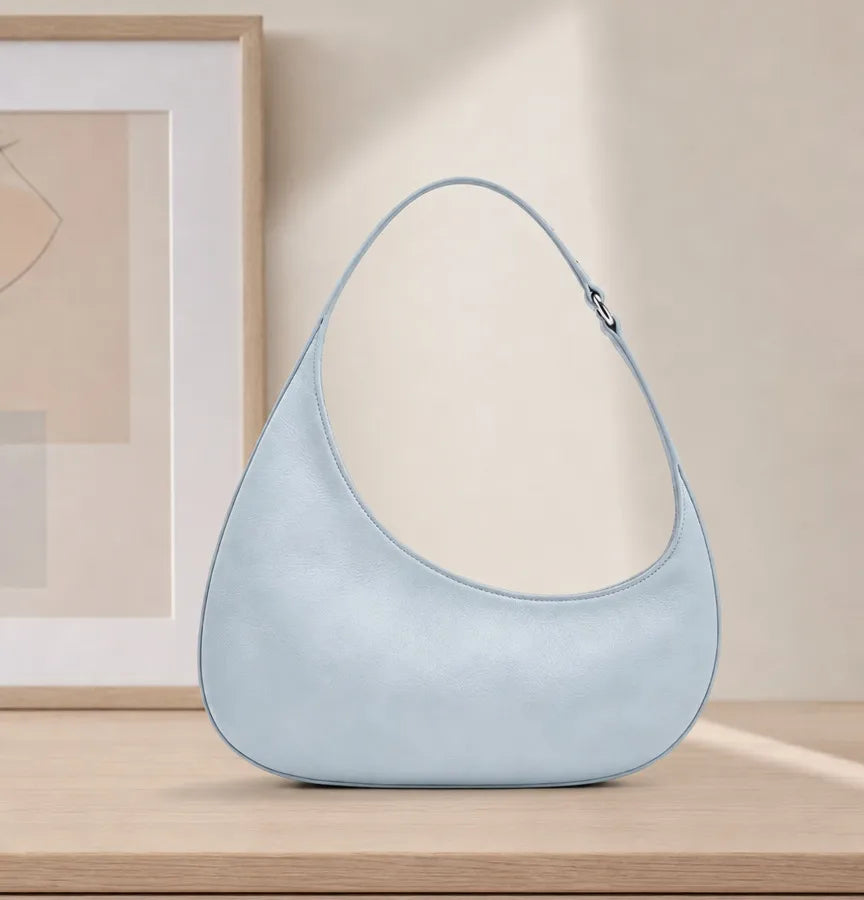 Oval Shoulder Bag with Curved Handle in Light Blue | BTendance
