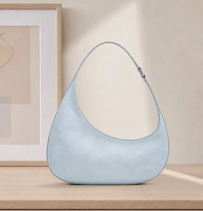 Oval Shoulder Bag with Curved Handle in Light Blue | BTendance