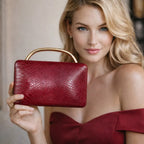 Croc-Embossed Faux Leather Top Handle Evening Bag – Wine red held for scale | BTendance
