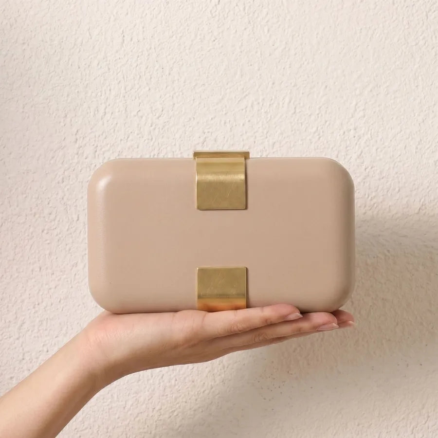 Rectangular evening clutch — beige held in one hand | BTendance