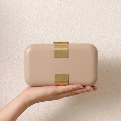Rectangular evening clutch — beige held in one hand | BTendance