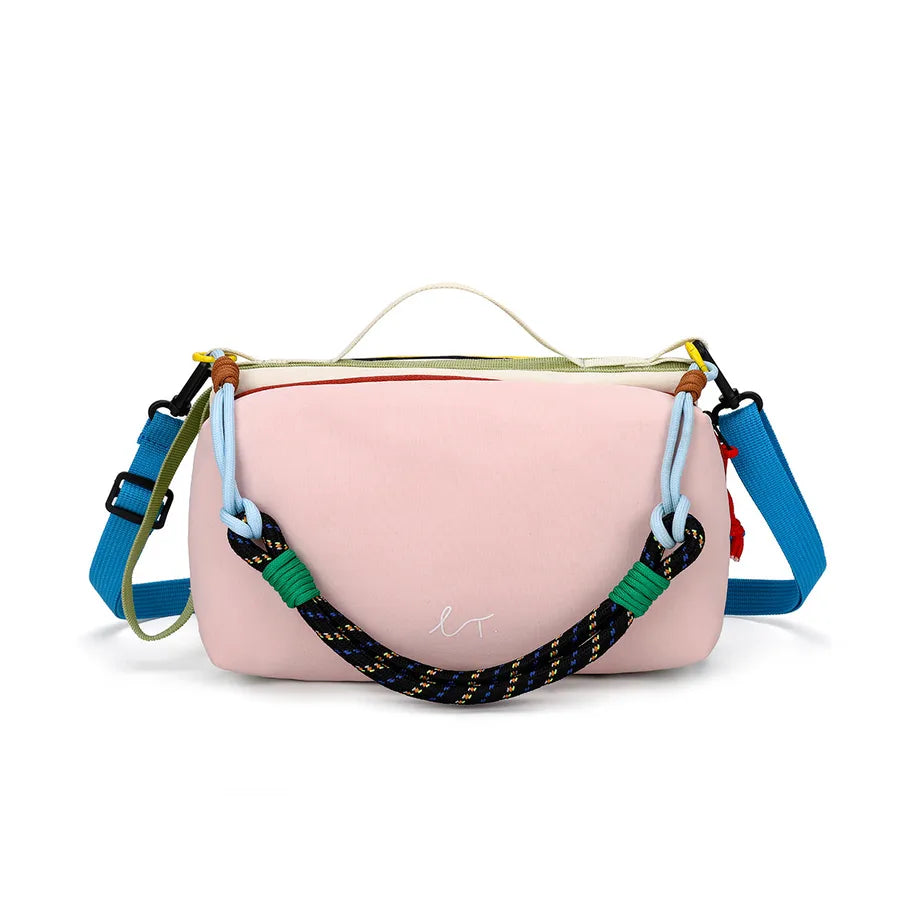 Color-block crossbody bag with rope handle — pink front view on white background | BTendance