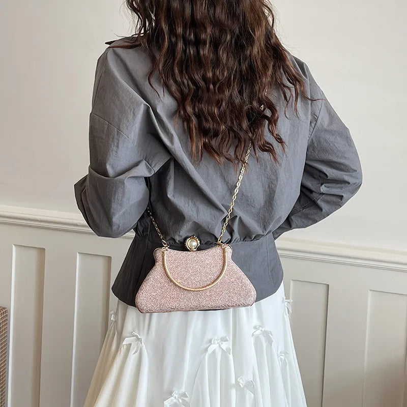 Women's Textured Evening Bag with Pearl-Effect Clasp – Pink worn crossbody | BTendance