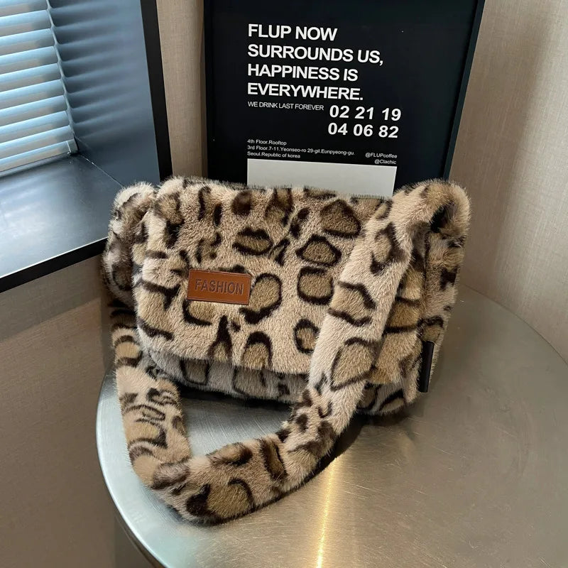 Leopard-print plush shoulder bag — cream leopard print on table | BTendance