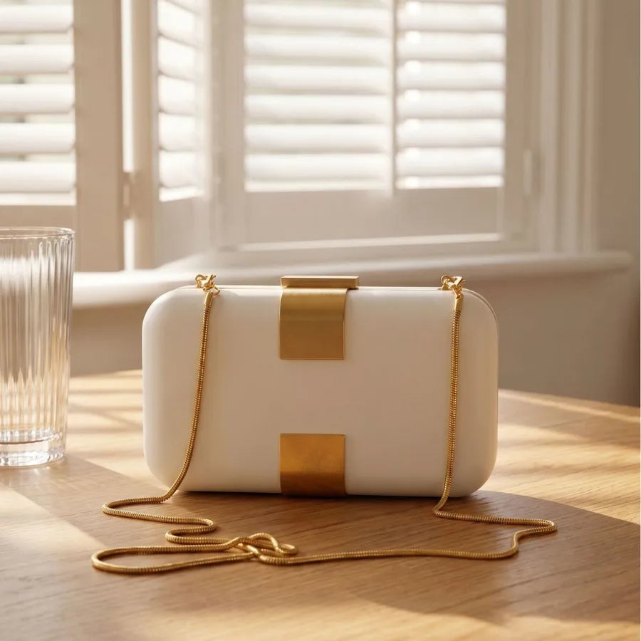 Rectangular evening clutch — ivory with gold-tone front accents and chain strap | BTendance