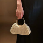 Women's Pleated Polyester Ring Handle Evening Clutch – Apricot carried by handle | BTendance