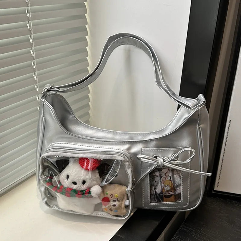 Shoulder bag with clear front display pocket — silver with plush decorations in clear pocket | BTendance