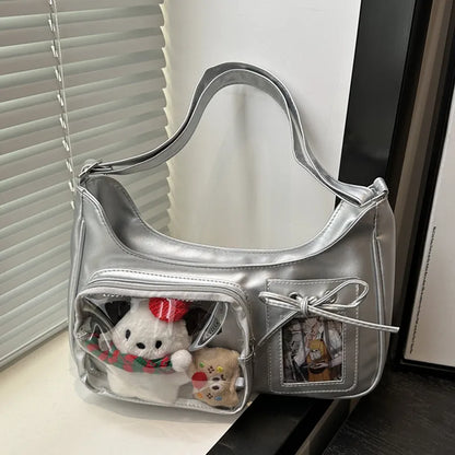 Shoulder bag with clear front display pocket — silver with plush decorations in clear pocket | BTendance