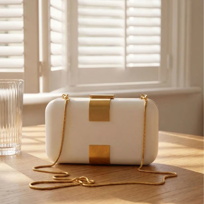 Rectangular evening clutch — ivory with gold-tone front accents and chain strap | BTendance