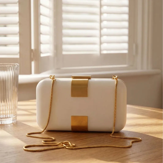 Rectangular evening clutch — ivory with gold-tone front accents and chain strap | BTendance