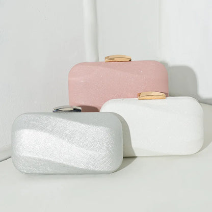Rounded rectangular evening clutch with metal clasp — silver white and pink grouped together | BTendance