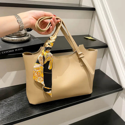 Shoulder tote bag with patterned scarf – Beige bag held by its handles | BTendance