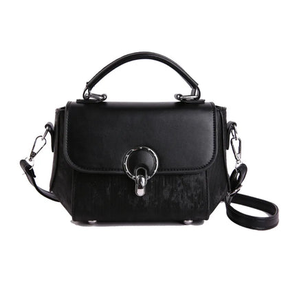 Ring clasp top handle crossbody bag – Black bag with shoulder strap, front view | BTendance