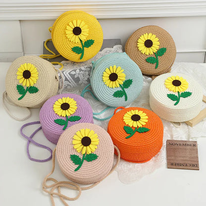 Round woven sunflower crossbody bag – Assorted colours with stem and leaf sunflower motif | BTendance
