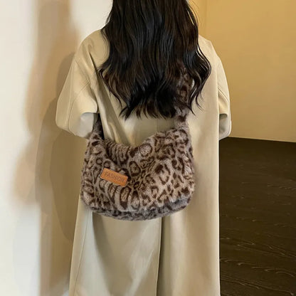 Leopard-print plush shoulder bag — grey worn over cream coat | BTendance