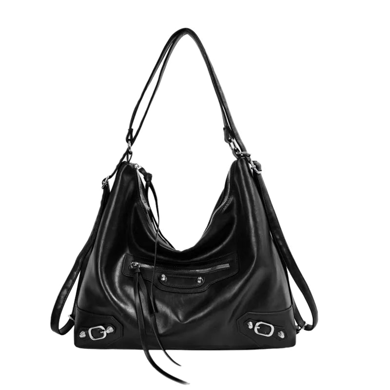 Slouchy shoulder bag with front zip and buckle details — black on white background | BTendance