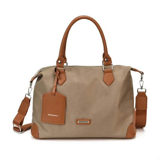 Nylon handbag with contrast handles and shoulder strap — taupe with tan trim on white background | BTendance