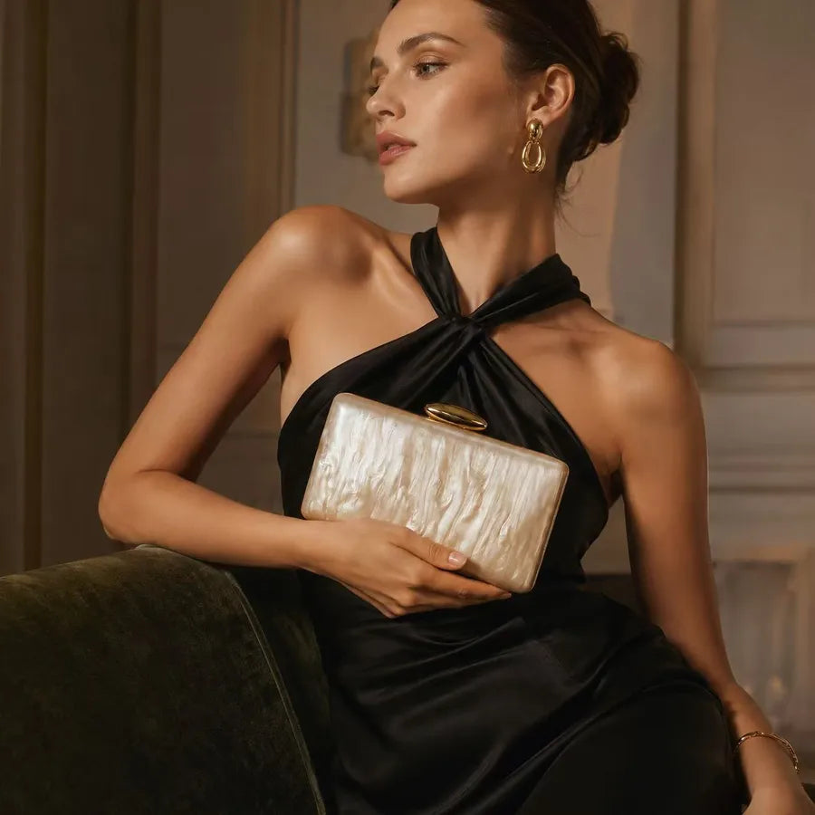 Women's Marbled Acrylic Rectangle Clutch with Oval Clasp – Champagne held for scale | BTendance