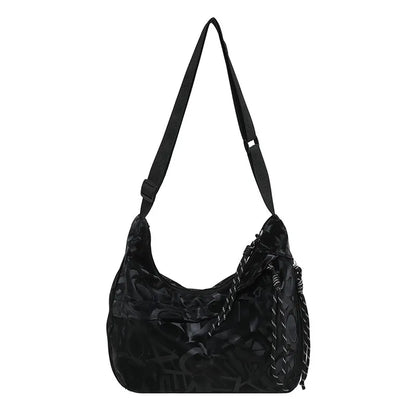 Patterned shoulder bag with braided front detail — black on white background | BTendance