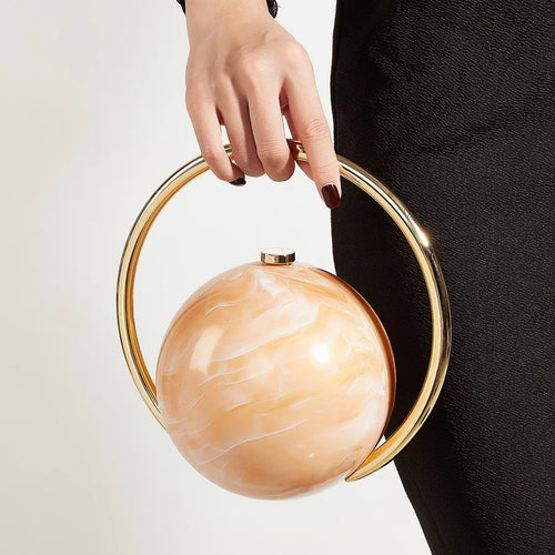 Marbled Globe Evening Bag with Orbit Handle – Light coffee carried by handle | BTendance