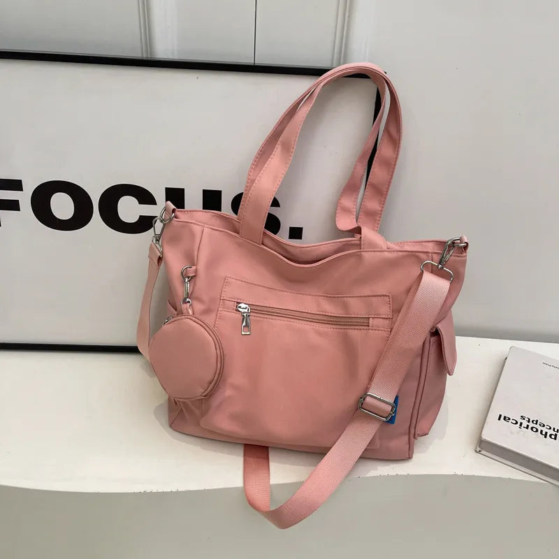 Pocket tote bag with round pouch – Pink bag with round pouch on display | BTendance